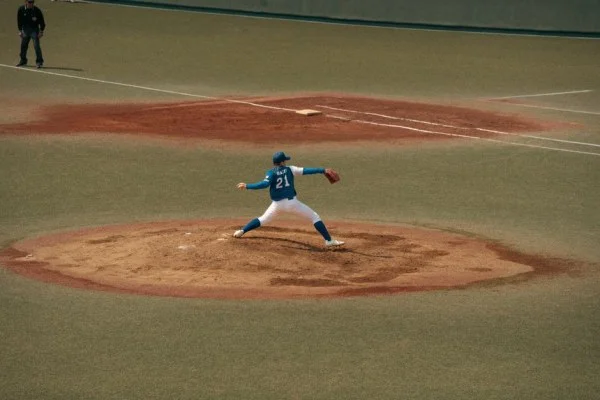 pitcher throwing baseball